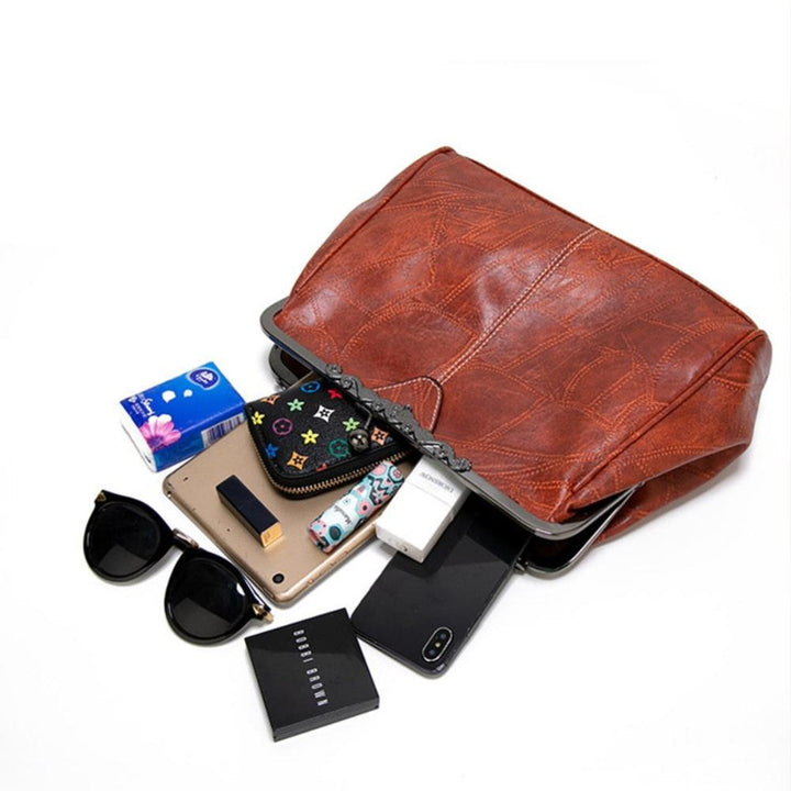 Mila | Bolsa de mão vintage com fecho de aba