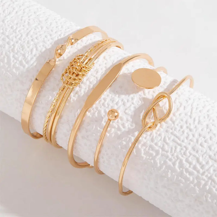 Conjunto de Pulseiras de Ouro com Elegância Sofisticada e Nó