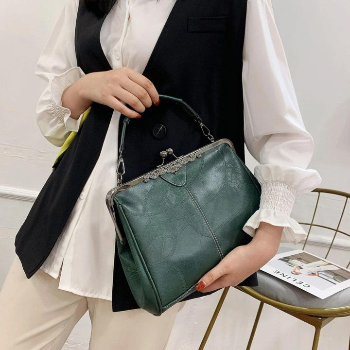 Mila | Bolsa de mão vintage com fecho de aba