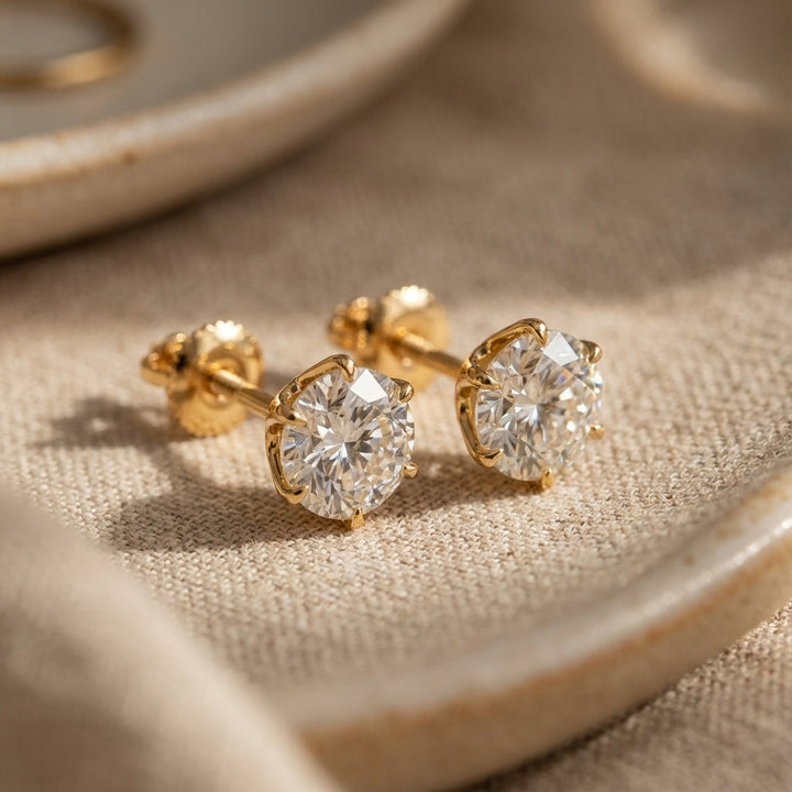 Brincos Elegantes Tera em Ouro