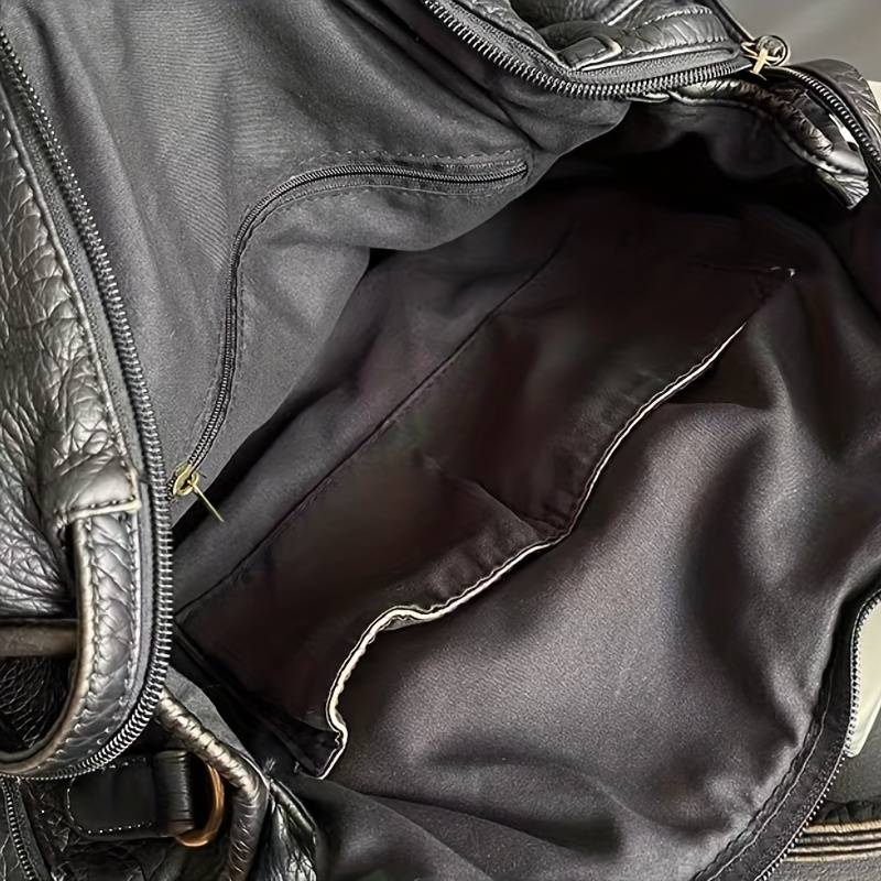 Bolsa de mão preta de couro vintage elegante